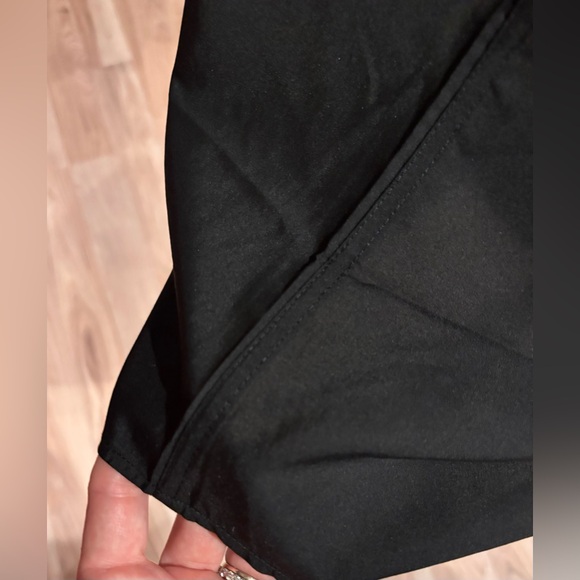 Simple black men’s shirt only worn once 2XL—dress it up
or dress it ups it down! - Picture 5 of 6